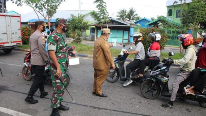 FOTO. Sinergitas TNI-Polri Dan Pemkab Nabire Dalam Menekan Penularan Virus Covid 19 Varian Omicron di wilayahnya