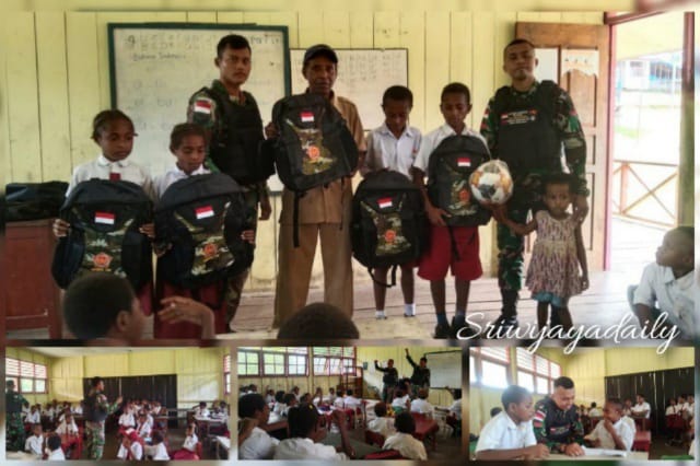 Satgas Yonif 143/TWEJ Beri Hadiah Kepada Siswa Berprestasi Dan Bantuan Alat Olahraga Di Sekolah Perbatasan Papua